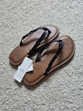 Hollister Women's Tan Footbed Flip Flops with Black Braided Straps